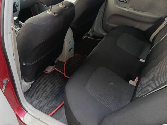 Красный Киа Черато, объемом двигателя 1.6 л и пробегом 240 тыс. км за 3300 $, фото 7 на Automoto.ua