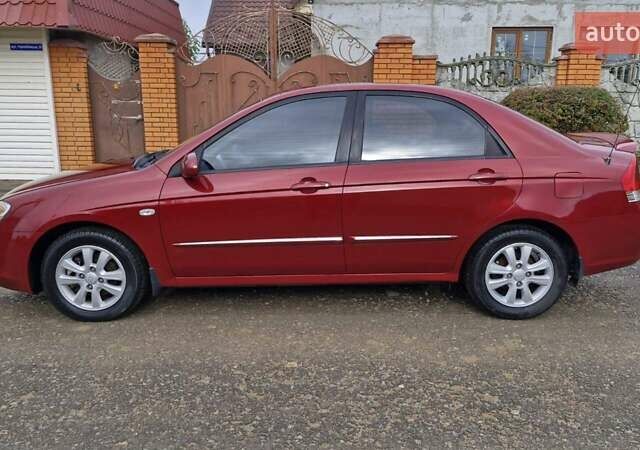 Красный Киа Черато, объемом двигателя 1.98 л и пробегом 120 тыс. км за 5650 $, фото 12 на Automoto.ua