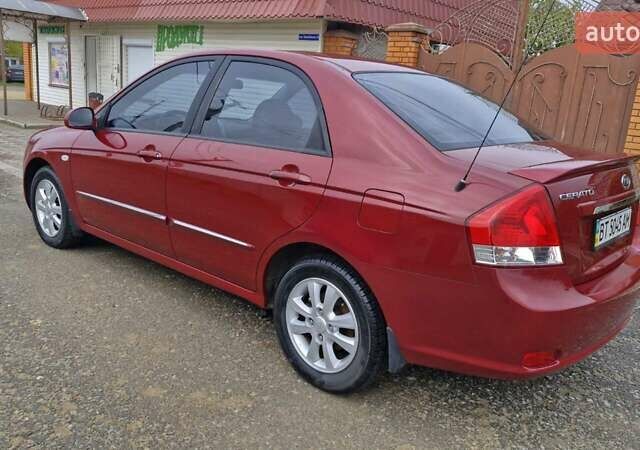 Красный Киа Черато, объемом двигателя 1.98 л и пробегом 120 тыс. км за 5650 $, фото 17 на Automoto.ua