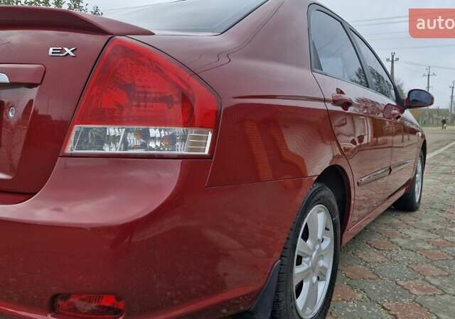 Красный Киа Черато, объемом двигателя 1.98 л и пробегом 120 тыс. км за 5650 $, фото 2 на Automoto.ua