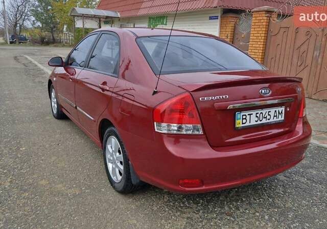 Красный Киа Черато, объемом двигателя 1.98 л и пробегом 120 тыс. км за 5650 $, фото 20 на Automoto.ua