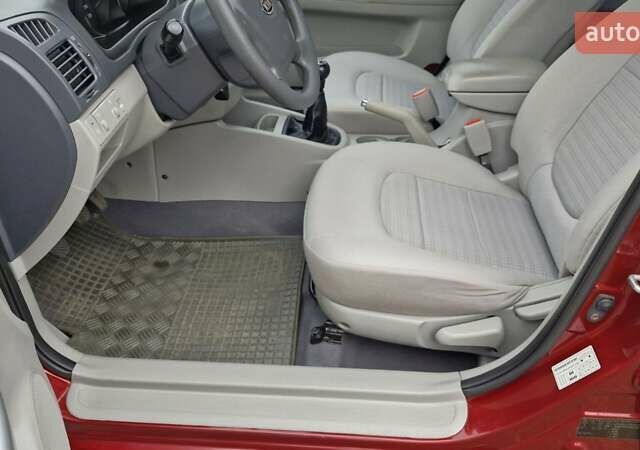 Красный Киа Черато, объемом двигателя 1.98 л и пробегом 120 тыс. км за 5650 $, фото 34 на Automoto.ua
