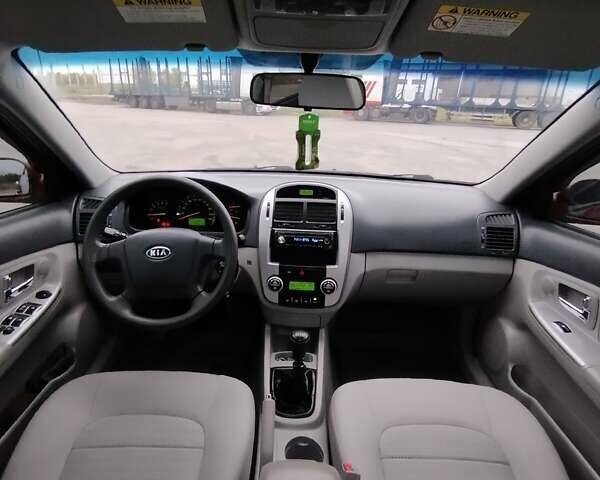 Кіа Черато 2008 у Коростене на Automoto.ua Червоний Кіа Черато, об'ємом двигуна 1.6 л та пробігом 126 тис. км за 5599 $, фото 30 на Automoto.ua