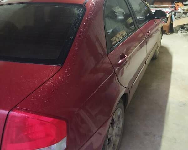 Червоний Кіа Черато, об'ємом двигуна 1.59 л та пробігом 322 тис. км за 3500 $, фото 1 на Automoto.ua