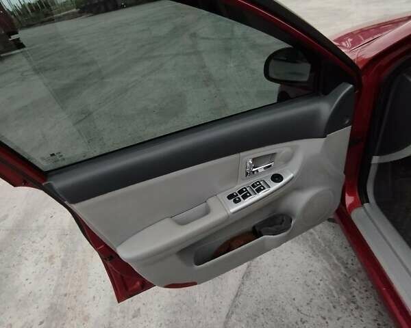 Кіа Черато 2008 у Коростене на Automoto.ua Червоний Кіа Черато, об'ємом двигуна 1.6 л та пробігом 126 тис. км за 5599 $, фото 26 на Automoto.ua