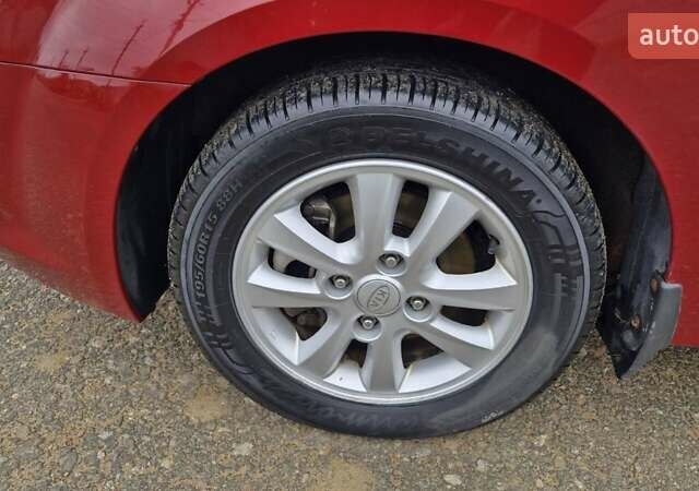 Красный Киа Черато, объемом двигателя 1.98 л и пробегом 120 тыс. км за 5650 $, фото 26 на Automoto.ua