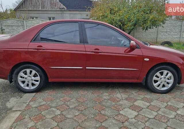 Красный Киа Черато, объемом двигателя 1.98 л и пробегом 120 тыс. км за 5650 $, фото 11 на Automoto.ua