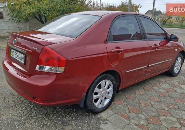 Красный Киа Черато, объемом двигателя 1.98 л и пробегом 120 тыс. км за 5650 $, фото 22 на Automoto.ua