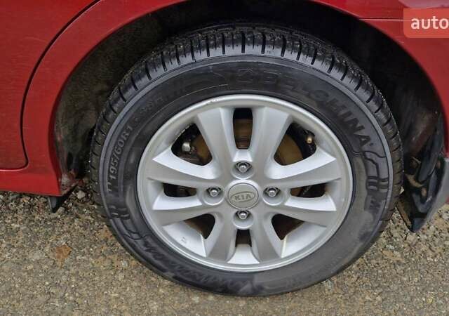 Красный Киа Черато, объемом двигателя 1.98 л и пробегом 120 тыс. км за 5650 $, фото 29 на Automoto.ua