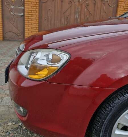 Красный Киа Черато, объемом двигателя 1.98 л и пробегом 120 тыс. км за 5650 $, фото 8 на Automoto.ua