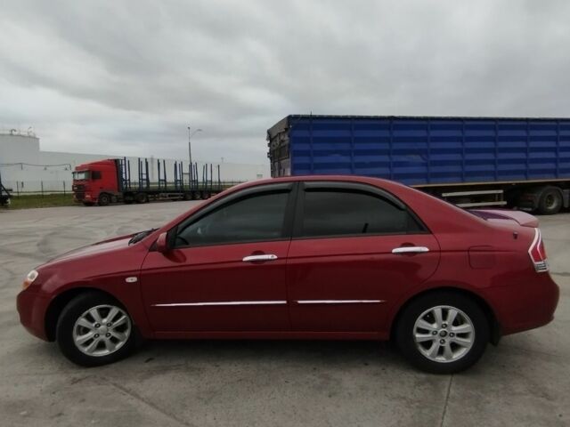 Киа Черато 2008 в Коростене на Automoto.ua Красный Киа Черато, объемом двигателя 1.6 л и пробегом 126 тыс. км за 5599 $, фото 3 на Automoto.ua