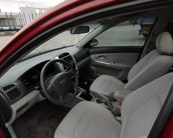 Кіа Черато 2008 у Коростене на Automoto.ua Червоний Кіа Черато, об'ємом двигуна 1.6 л та пробігом 126 тис. км за 5599 $, фото 27 на Automoto.ua