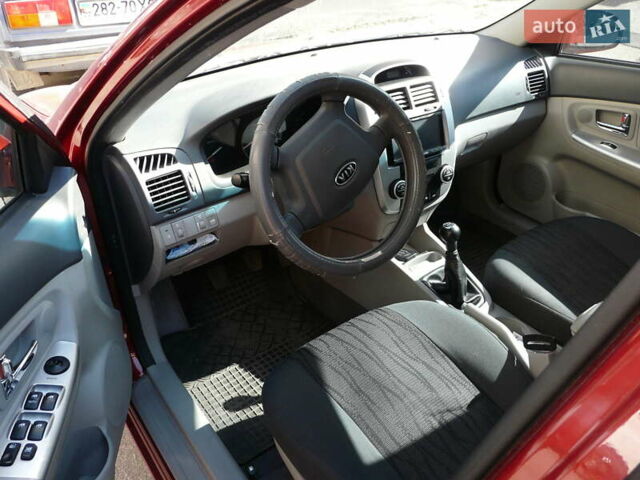 Червоний Кіа Черато, об'ємом двигуна 1.98 л та пробігом 129 тис. км за 5200 $, фото 3 на Automoto.ua