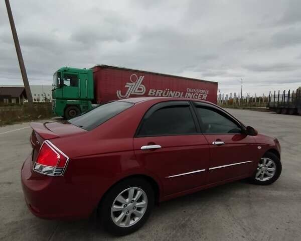 Кіа Черато 2008 у Коростене на Automoto.ua Червоний Кіа Черато, об'ємом двигуна 1.6 л та пробігом 126 тис. км за 5599 $, фото 24 на Automoto.ua