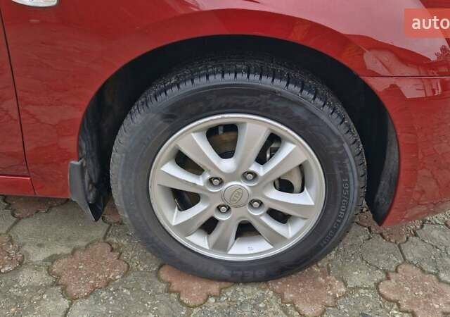 Красный Киа Черато, объемом двигателя 1.98 л и пробегом 120 тыс. км за 5650 $, фото 18 на Automoto.ua