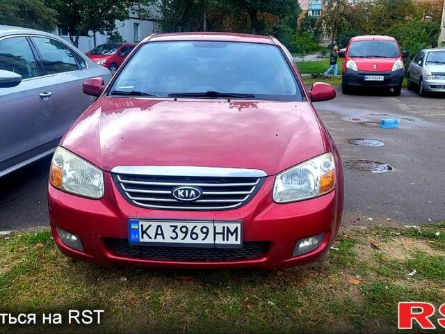 Красный Киа Черато, объемом двигателя 2 л и пробегом 254 тыс. км за 5300 $, фото 5 на Automoto.ua