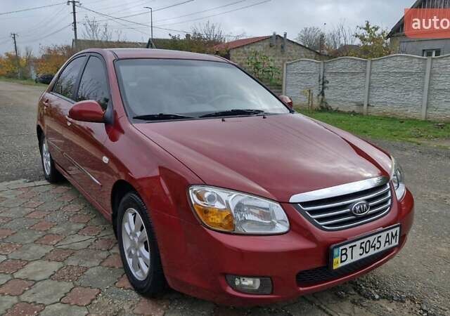 Красный Киа Черато, объемом двигателя 1.98 л и пробегом 120 тыс. км за 5650 $, фото 10 на Automoto.ua