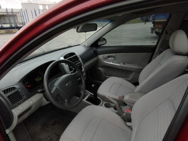 Киа Черато 2008 в Коростене на Automoto.ua Красный Киа Черато, объемом двигателя 1.6 л и пробегом 126 тыс. км за 5599 $, фото 5 на Automoto.ua