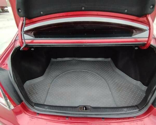 Кіа Черато 2008 у Коростене на Automoto.ua Червоний Кіа Черато, об'ємом двигуна 1.6 л та пробігом 126 тис. км за 5599 $, фото 14 на Automoto.ua