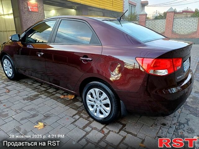 Киа Черато 2009 в Николаеве на Automoto.ua Красный Киа Черато, объемом двигателя 1.6 л и пробегом 170 тыс. км за 6200 $, фото 8 на Automoto.ua