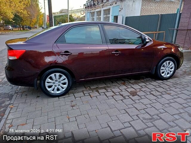 Киа Черато 2009 в Николаеве на Automoto.ua Красный Киа Черато, объемом двигателя 1.6 л и пробегом 170 тыс. км за 6200 $, фото 12 на Automoto.ua