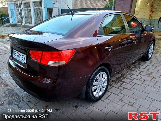 Киа Черато 2009 в Николаеве на Automoto.ua Красный Киа Черато, объемом двигателя 1.6 л и пробегом 170 тыс. км за 6200 $, фото 13 на Automoto.ua