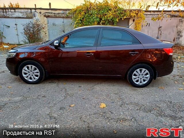 Красный Киа Черато, объемом двигателя 1.6 л и пробегом 170 тыс. км за 6200 $, фото 5 на Automoto.ua