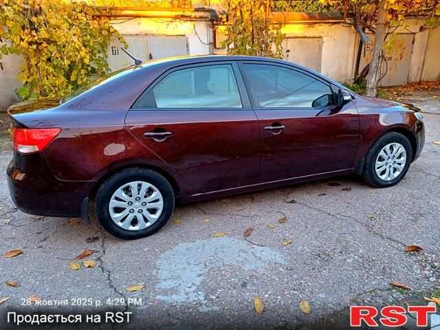 Красный Киа Черато, объемом двигателя 1.6 л и пробегом 170 тыс. км за 6200 $, фото 1 на Automoto.ua