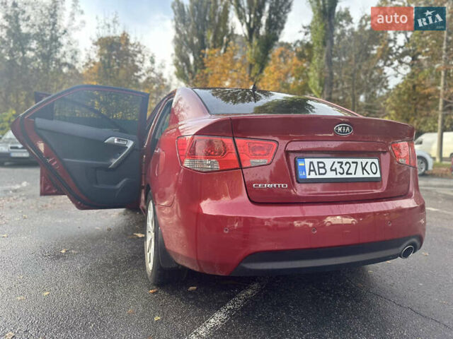 Киа Черато 2009 в Виннице на Automoto.ua Красный Киа Черато, объемом двигателя 2 л и пробегом 179 тыс. км за 8500 $, фото 12 на Automoto.ua