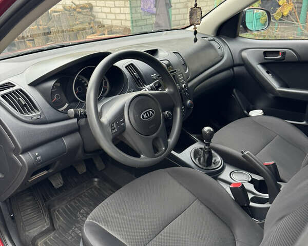 Красный Киа Черато, объемом двигателя 1.59 л и пробегом 142 тыс. км за 6000 $, фото 13 на Automoto.ua