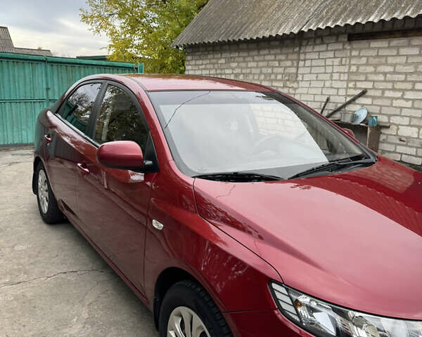 Красный Киа Черато, объемом двигателя 1.59 л и пробегом 142 тыс. км за 6000 $, фото 6 на Automoto.ua