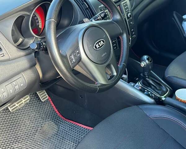 Киа Черато 2011 в Киеве на Automoto.ua Красный Киа Черато, объемом двигателя 1.59 л и пробегом 264 тыс. км за 6899 $, фото 4 на Automoto.ua