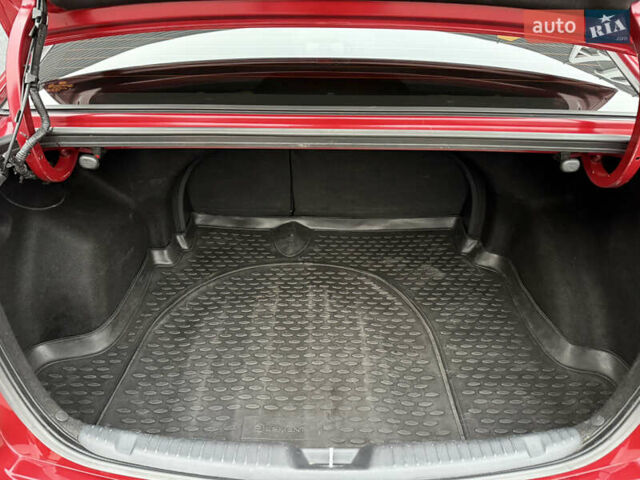 Красный Киа Черато, объемом двигателя 1.6 л и пробегом 200 тыс. км за 8900 $, фото 19 на Automoto.ua