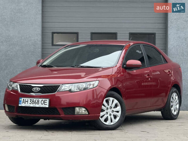 Красный Киа Черато, объемом двигателя 1.6 л и пробегом 200 тыс. км за 8900 $, фото 1 на Automoto.ua