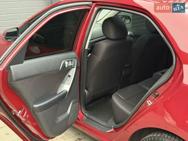 Красный Киа Черато, объемом двигателя 1.6 л и пробегом 200 тыс. км за 8900 $, фото 10 на Automoto.ua