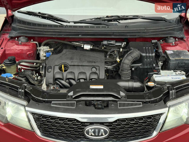 Красный Киа Черато, объемом двигателя 1.6 л и пробегом 200 тыс. км за 8900 $, фото 20 на Automoto.ua