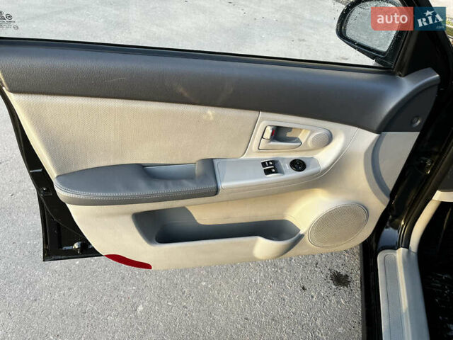 Киа Черато, объемом двигателя 1.58 л и пробегом 180 тыс. км за 5000 $, фото 7 на Automoto.ua