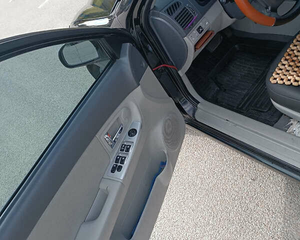 Киа Черато, объемом двигателя 2 л и пробегом 298 тыс. км за 4000 $, фото 10 на Automoto.ua