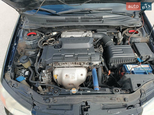 Киа Черато, объемом двигателя 2 л и пробегом 298 тыс. км за 4000 $, фото 12 на Automoto.ua