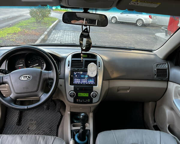 Жовтий Кіа Черато, об'ємом двигуна 1.6 л та пробігом 213 тис. км за 4800 $, фото 1 на Automoto.ua