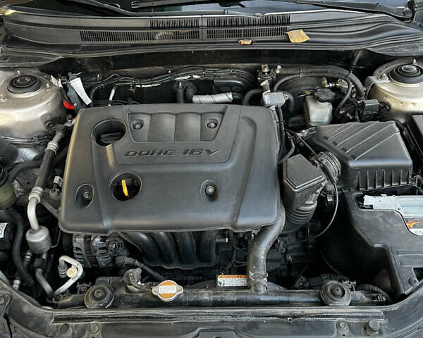 Жовтий Кіа Черато, об'ємом двигуна 1.6 л та пробігом 213 тис. км за 4800 $, фото 6 на Automoto.ua