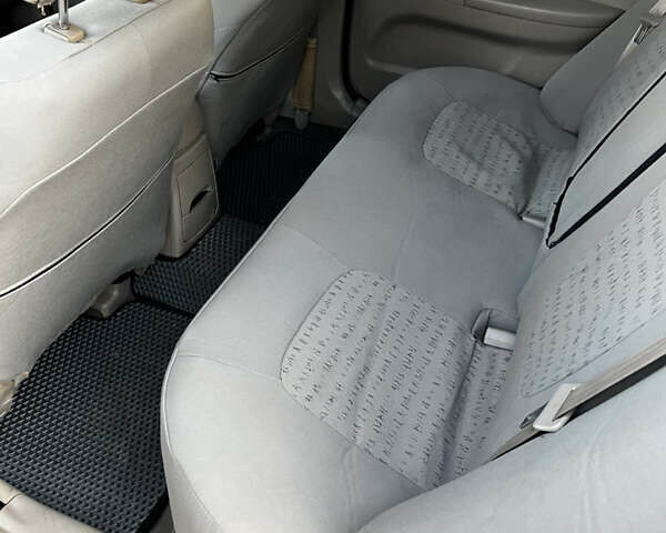 Жовтий Кіа Черато, об'ємом двигуна 1.6 л та пробігом 213 тис. км за 4800 $, фото 3 на Automoto.ua