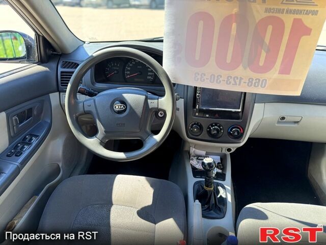 Сірий Кіа Черато, об'ємом двигуна 2 л та пробігом 295 тис. км за 3500 $, фото 7 на Automoto.ua