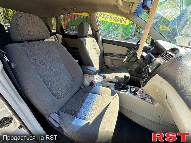 Сірий Кіа Черато, об'ємом двигуна 2 л та пробігом 295 тис. км за 3500 $, фото 5 на Automoto.ua