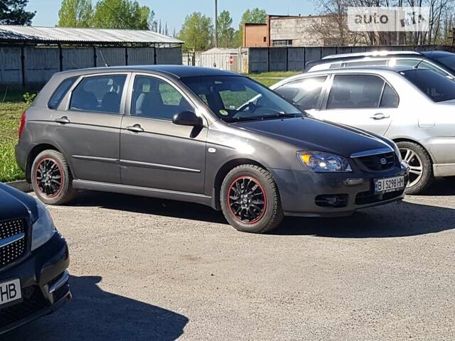 Сірий Кіа Черато, об'ємом двигуна 2 л та пробігом 230 тис. км за 4800 $, фото 3 на Automoto.ua