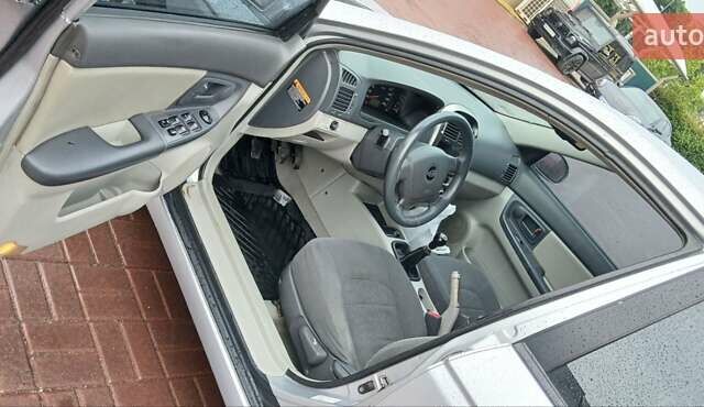 Серый Киа Черато, объемом двигателя 1.6 л и пробегом 285 тыс. км за 3250 $, фото 7 на Automoto.ua