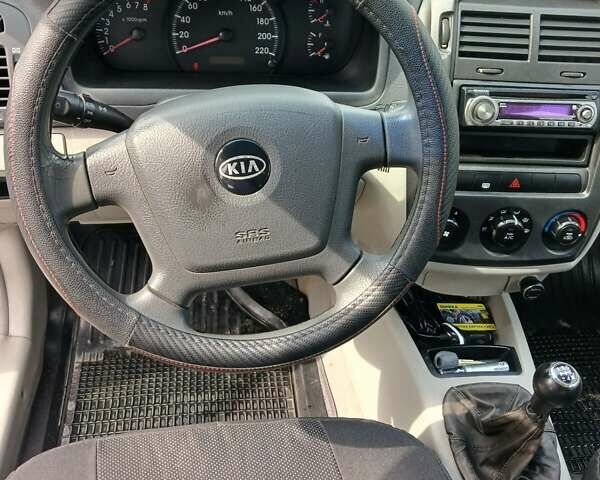 Серый Киа Черато, объемом двигателя 1.6 л и пробегом 192 тыс. км за 4200 $, фото 15 на Automoto.ua