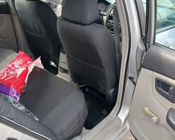 Серый Киа Черато, объемом двигателя 1.6 л и пробегом 192 тыс. км за 4200 $, фото 12 на Automoto.ua