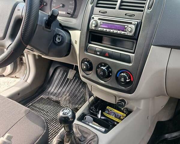 Серый Киа Черато, объемом двигателя 1.6 л и пробегом 192 тыс. км за 4200 $, фото 14 на Automoto.ua