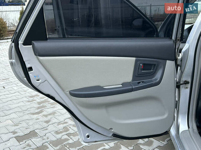 Серый Киа Черато, объемом двигателя 1.6 л и пробегом 177 тыс. км за 4000 $, фото 20 на Automoto.ua